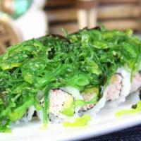 Spicy Country · Spicy tuna, cucumber topped seaweed salad.