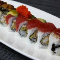 37. Nice Roll · Cab shrimp tempura, crab topped with tuna, unagi, and avocado.