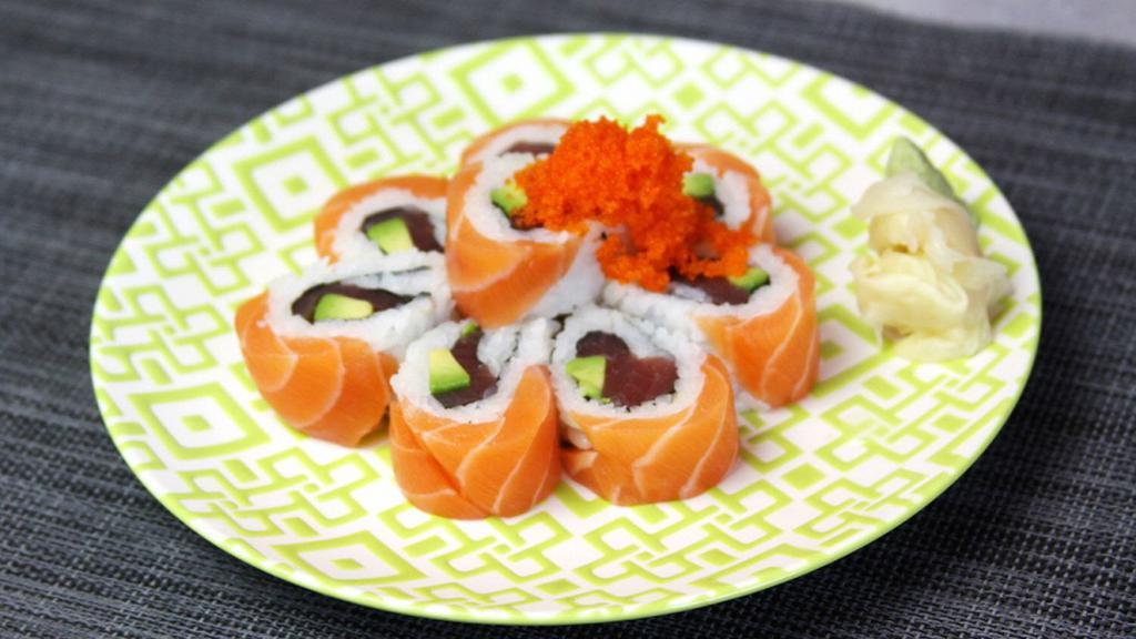 39. Orange Blossom · Tuna and avocado covered with fresh salmon and tobiko.