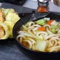 4. Tempura Udon · Noodle cooked in broth with tempura and vegetables.