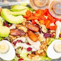 Marrakesh Express · Chicken, romaine, mediool dates, avocado, walnuts, chopped eggs, dried cranberries, red bell...