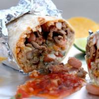 California Burrito · Flour tortilla filled with beans, avocado, Jack and Cheddar cheeses, rice, lettuce and fresh...