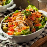 Chipotle Salad · Grilled shrimp salad with garden fresh romaine, avocado, beans and corn mix, salsa, and chee...