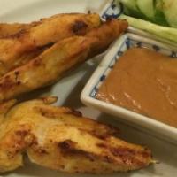 Satay (4) · Chicken or pork charbroil with herb served with cucumber dip and creamy peanut sauce.