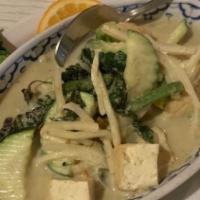 43. Green Curry · Hot spicy. Coconut milk, veg, basil in green curry sauce, your choice of: tofu, chicken, por...