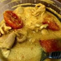 39. Kang Curry · Mild. Chicken simmery in yellow curry coconut milk w/potato and carrot.