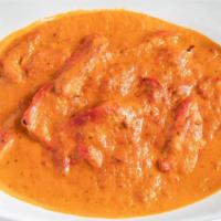 Butter Chicken · Chicken meat tandoori in our special creamy onion and tomato sauce.