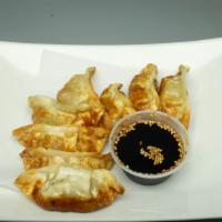 A02. Potsticker Vege with Chicken or Pork (8) · pot stickers with green cabbage with choice of pork or chicken.
-8pc