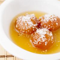Gulab Jamun · Balls made of Flour fried and dipped in sugar syrup. Delicacy from India