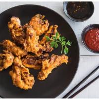 10pcs Korean Fried Chicken (치킨) - Sauce on the Side · Boneless and skinless non-gmo chicken thighs. Sauce on the side.