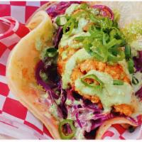 Korean Fried Chicken Taco · Famous ARIA's Korean Fried Chicken with the warm tortilla, chipotle aioli fresh coleslaw, an...