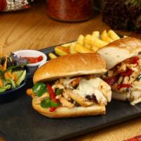 Halal BBQ Chicken Cheesesteak · Sizzling halal grilled chicken with BBQ sauce, sautéed onions, green peppers, and bell peppe...