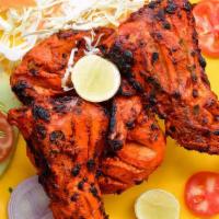 Tandoori Chicken - Half · Tender bone-in chicken, marinated with exotic tandoori spices. Most popular and spicy.