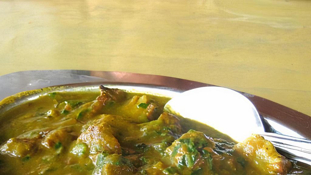 Goat Saagwala · Goat cooked with combination of simmered spinach and house spices. Spicy.