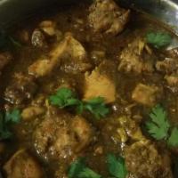 Gongura Chicken · One of the best traditional chicken dishes cooked with fresh gongura leaves.