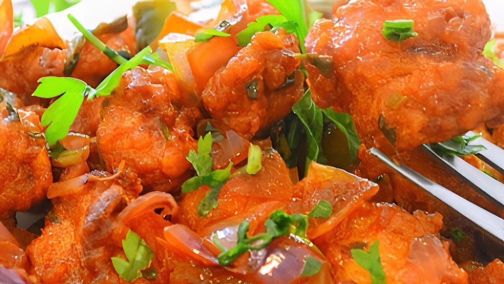 Ginger Chicken · Chicken cooked with exotic ginger sauce and chilies.