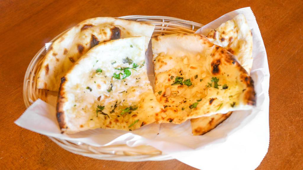 Garlic Basil Naan · Flat bread topped with garlic and basil chef's recommendation.