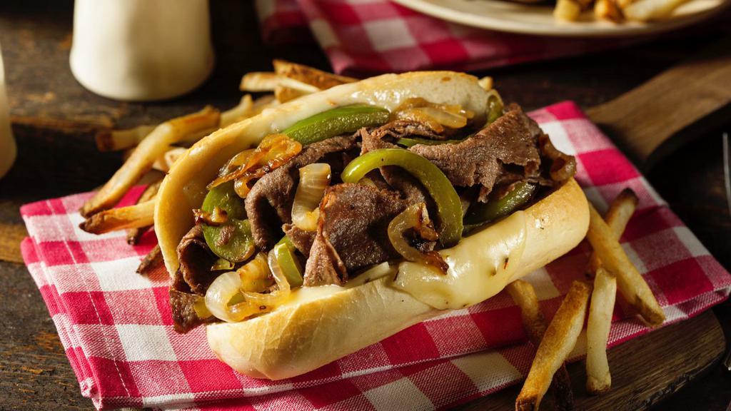 Philly Steak with Fries · Fresh cut thinly sliced steak mixed with grilled bell peppers, mushrooms, onions, mayonnaise and swiss cheese. Served with French fries.