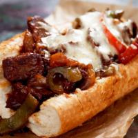 Combo Philly with Fries · Classic combo Philly sandwich with customer's choice of meat, grilled onions, bell peppers, ...