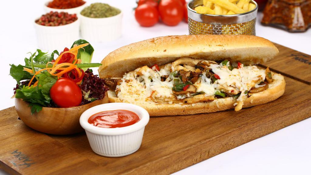 Philly Garlic Chicken with Fries · Cooked white chicken meat mixed with garlic sauce, grilled onions, bell peppers, mushrooms topped with mayonaise and swiss cheese. Served with French fries.