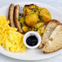 American Breakfast · Scrambled eggs, breakfast potatoes, choice of applewood smoked bacon or breakfast sausage, s...
