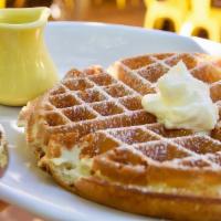 Belgian Waffle · Buttermilk Belgian waffle, powdered sugar, whipped, butter, organic vermont maple syrup.