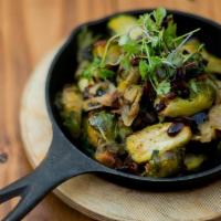 Roasted Brussels Sprouts · bacon, caramelized onions, balsamic reduction