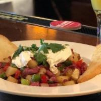 Corned Beef Hash & Eggs · potatoes, peppers, onions, two poached eggs, sourdough toast. Item Only Available 10am-2pm o...