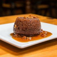 Sticky Toffee Pudding · candied pecans, caramel sauce, whipped cream