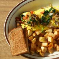 44. Veggie Omelette · Fresh spinach, zucchini, mushrooms, onions and tomato.