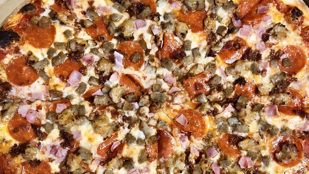 Meat Lover · Pepperoni, sausage, meatball, ham, bacon and cheese.