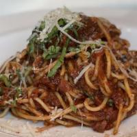 Spaghetti Bolognese · Prepared with traditional meat sauce with spaghetti pasta.