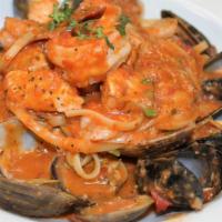 Frutti di Mare · Linguini pasta served with pan seared prawns, scallops, mussels, rock shrimp, manila clams a...