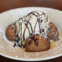Deep Fried Oreos · Vanilla gelato, crème anglaise, drizzled with chocolate sauce.