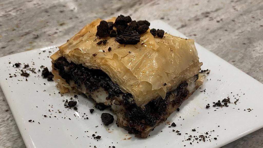 Oreo Baklava · Filo Dough Stuffed With Homemade Cream & Crumbled Oreo's Topped with Lightly Sweetened Home Made Vanilla Syrup. Baked Fresh! Falafel Boy Creations!!