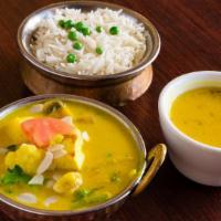 Navaratna Korma · Seasonal mixed vegetables cooked in a creamy sauce with coconut milk and cashew nuts.