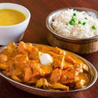 Butter Chicken · Shredded tandoori chicken thigh cooked in creamy tomato sauce, accented with dry fenugreek a...