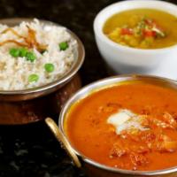 Chicken Curry · Boneless chicken thigh cooked in onion and tomato sauce with special Himalayan herbs and spi...