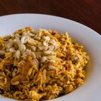 Lamb Biryani · Basmati rice, cooked with marinated tender lamb, nuts, dried fruits with a blend of herbs an...