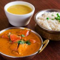 Chicken Tikka Masala · Tandoori chicken breast cubes cooked in creamy tomato sauce, accented with dry fenugreek.