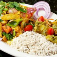 Chicken Chholia · Overnight Marinated pieces of chicken baked in tandoor oven and mixed with onion, bell peppe...