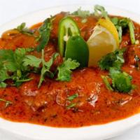 Chicken Karahi · Chicken cooked with bell peppers and onions.