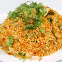 Vegetable Biryani · Spiced basmati rice cooked with vegetables.