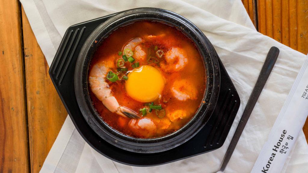 Tofu Soup · Spicy soup made with soft tofu and seafood. Served with rice.