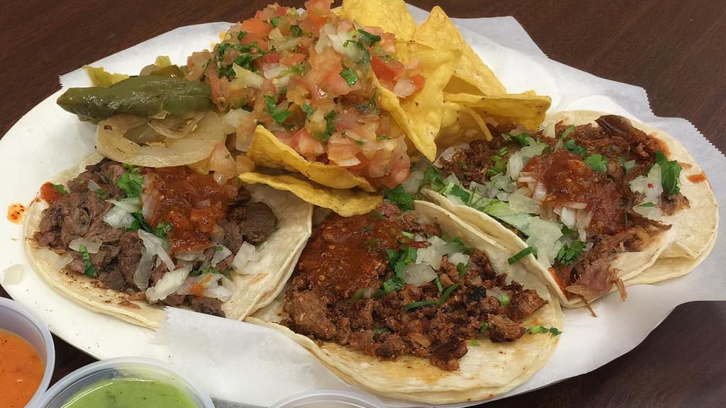 Make Your Own Street Tacos · 12 Corn Tortillas, Choice of Meat, Cilantro, Onions, & salsa.  Served with Chips & Salsa