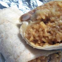 Classic Burrito · Beans, cheese, & rice. Served with chips & salsa