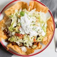 Vegan Protein Taco Salad · Choice of protein, rice, beans, cheese, sour cream, pico de gallo, lettuce and avocado, serv...