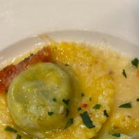 Ravioli · fresh pasta with bellwether farms ricotta & stinging nettle filling, butter, slow-roasted to...
