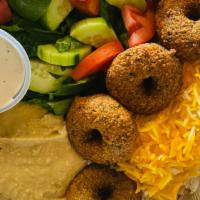 Vegetarian Plate · Hummus, Basmati Rice, Salad, Falafel.