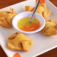 8. Crab Rangoon (4) · Deep fry of cream cheese and crab meat wrapped in wonton skin.